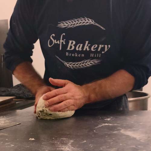hand molding dough at the bakery sufi bakery
