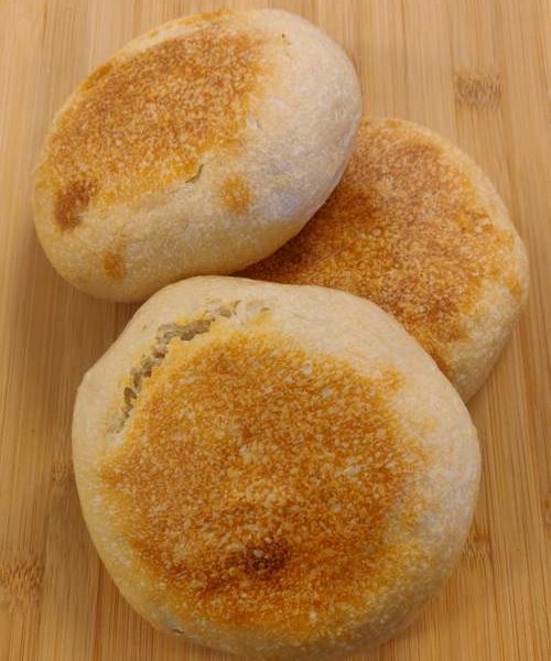 a collection of sourdough hamburger rolls